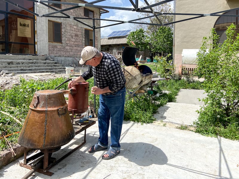 Sergo from B&B Odzun making homemade vodka