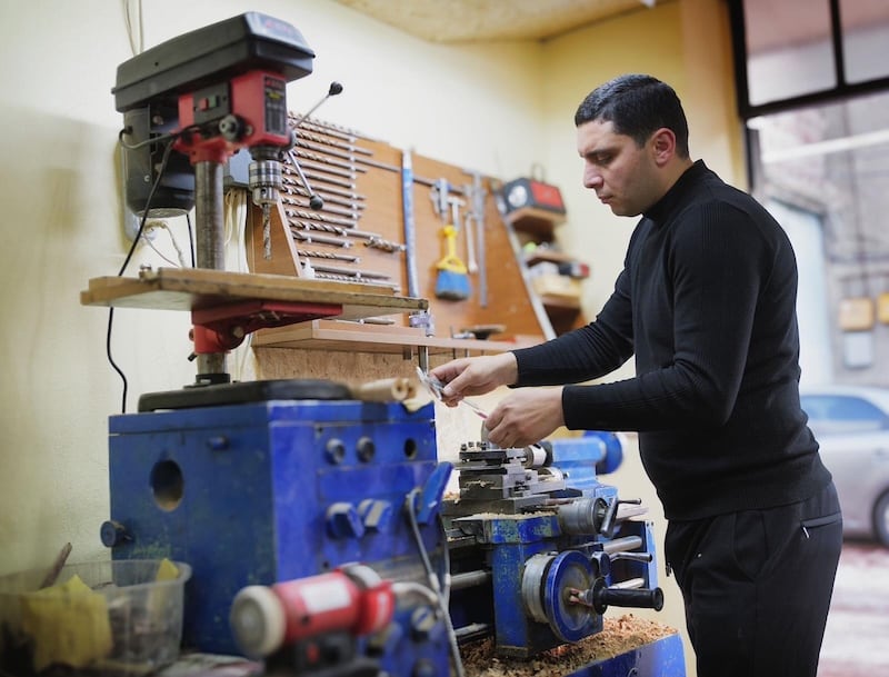 Armenian man making Duduk