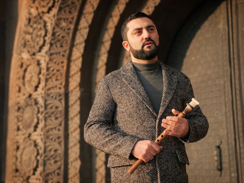 Armenian man playing Duduk